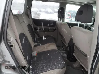 2006 Nissan X-Trail XE z VIN JN8BT08VX6W210650, wystawiony jako Copart lot #42935915 z przebiegiem 240 000 mil mil oraz Szkody całkowita. Historia ofert i sprzedaży dostępna na DreamBid. Obrazek 11.