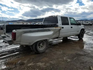1999 Chevrolet Silverado 3500 z VIN 1GCHC33J2XF087634, wystawiony jako Copart lot #58106714 z przebiegiem 205 431 mil mil oraz Czysty tytuł • Clean title. Historia ofert i sprzedaży dostępna na DreamBid. Obrazek 3.