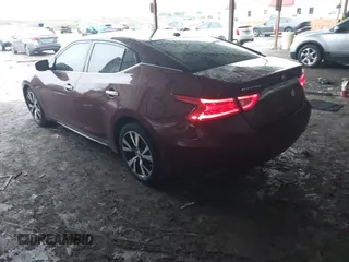 2016 Nissan Maxima SR z VIN 1N4AA6AP3GC434928, wystawiony jako IAAI lot #42180654 z przebiegiem 113 492 mil mil oraz . Historia ofert i sprzedaży dostępna na DreamBid. Obrazek 3.