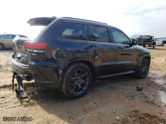 2019 Jeep Grand Cherokee Limited with VIN 1C4RJEBGXKC811026, listed as a Copart auction lot 45636585 with 122,840 mi miles and Salvage Title. Bid and sale history available at carsss.com. Image 3.