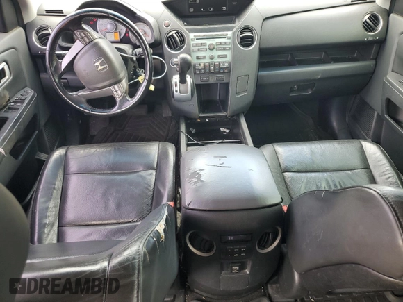 2009 Honda Pilot EX-L z VIN 5FNYF485X9B053974, wystawiony jako Copart lot #58231475 z przebiegiem 222 489 mil mil oraz Szkoda całkowita • Salvage title. Historia ofert i sprzedaży dostępna na DreamBid. Obrazek 8.