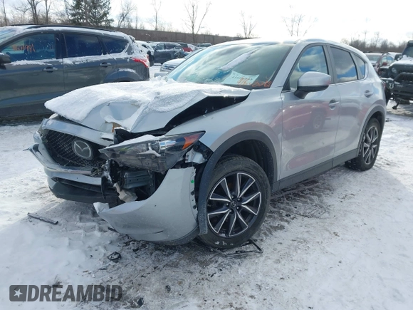 2018 Mazda CX-5 Touring with VIN JM3KFBCMXJ0463192, listed as a IAAI auction lot 41608868 with 78,337 mi miles. Bid and sale history available at carsss.com. Image 2.