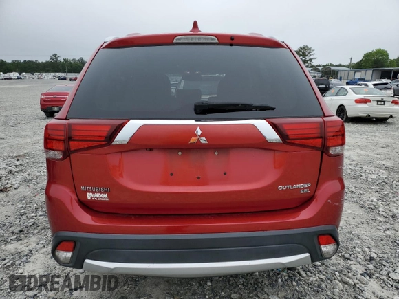 2018 Mitsubishi Outlander SE with VIN JA4AD3A33JZ013478, listed as a Copart auction lot 57941215 with 130,824 mi miles and Salvage title. Bid and sale history available at DreamBid. Image 6.