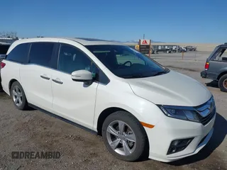 2019 Honda Odyssey EX-L with VIN 5FNRL6H78KB043279, listed as a IAAI auction lot 42041202 with 67,007 mi miles. Bid and sale history available at carsss.com. Image 1.