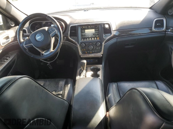 2017 Jeep Grand Cherokee Overland with VIN 1C4RJFCG9HC601806, listed as a Copart auction lot 61786275 with 122,898 mi miles and Salvage title. Bid and sale history available at DreamBid. Image 8.