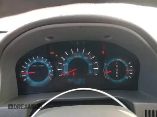 2010 Ford Fusion SE z VIN 3FAHP0HG4AR234696, wystawiony jako Copart lot #60597925 z przebiegiem 187 861 mil mil oraz Szkoda całkowita • Salvage title. Historia ofert i sprzedaży dostępna na DreamBid. Obrazek 9.