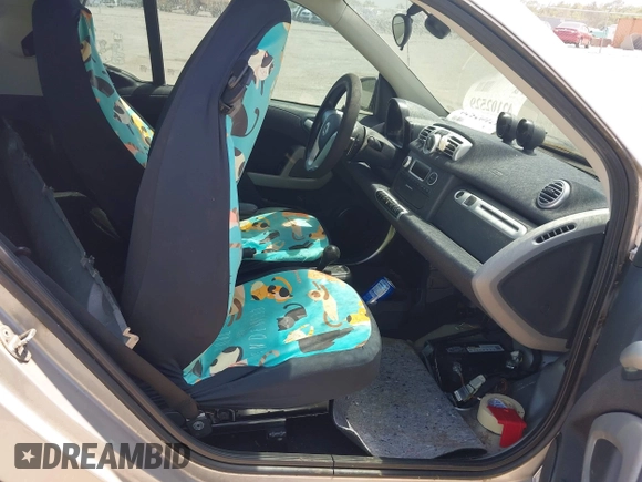 2013 Smart fortwo Pure with VIN WMEEJ3BA1DK632883, listed as a IAAI auction lot 42102529 with 74,071 mi miles. Bid and sale history available at carsss.com. Image 5.