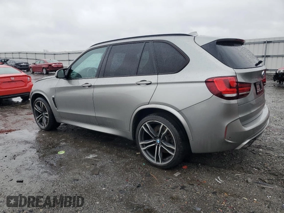 2016 BMW X5 M with VIN 5YMKT6C56G0R77641, listed as a Copart auction lot 43276205 with 86,910 mi miles and Salvage Title. Bid and sale history available at carsss.com. Image 2.