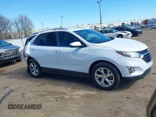 2019 Chevrolet Equinox LT with VIN 3GNAXLEX1KS681828, listed as a IAAI auction lot 41728085 with 72,512 mi miles and . Bid and sale history available at DreamBid. Image 13.