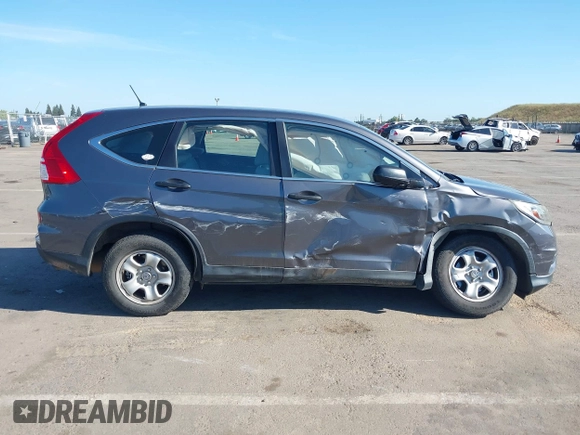 2015 Honda CR-V LX with VIN 3CZRM3H31FG709059, listed as a IAAI auction lot 42131551 with 98,738 mi miles and . Bid and sale history available at carsss.com. Image 13.
