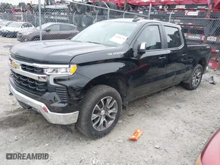 2024 Chevrolet Silverado 1500 LT with VIN 1GCUDDED1RZ287883, listed as a IAAI auction lot 41166328 with 14,276 mi miles. Bid and sale history available at carsss.com. Image 2.