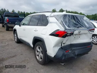 2019 Toyota RAV4 XLE with VIN JTMP1RFV6KD515454, listed as a IAAI auction lot 42618019 with 85,868 mi miles and . Bid and sale history available at DreamBid. Image 3.