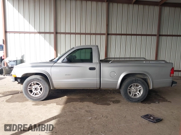 2002 Dodge Dakota z VIN 1B7FL36X42S532446, wystawiony jako IAAI lot #41683398 z przebiegiem 245 626 mil mil oraz . Historia ofert i sprzedaży dostępna na DreamBid. Obrazek 14.