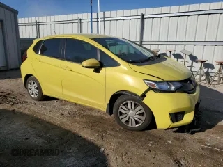 2015 Honda Fit LX with VIN 3HGGK5H51FM717584, listed as a Copart auction lot 87038334 with 143,447 mi miles and Salvage Title. Bid and sale history available at carsss.com. Image 4.