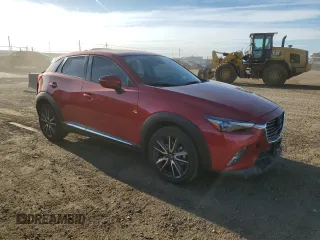 2018 Mazda CX-3 Grand Touring z VIN JM1DKFD79J0313779, wystawiony jako Copart lot #49120125 z przebiegiem 40 703 mil mil oraz Szkody całkowita. Historia ofert i sprzedaży dostępna na DreamBid. Obrazek 4.