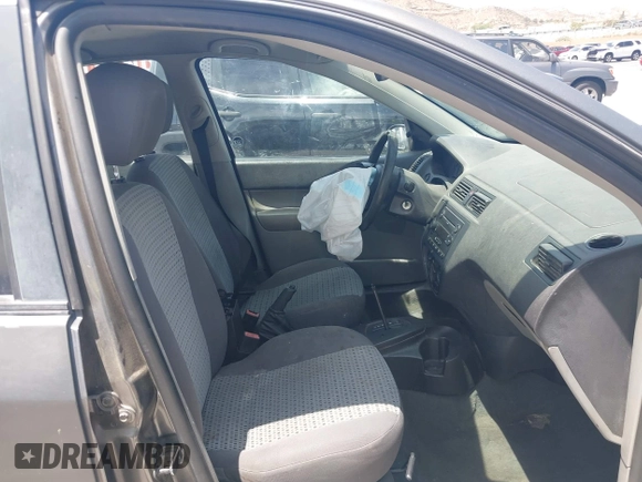 2007 Ford Focus S z VIN 1FAFP34N17W123378, wystawiony jako IAAI lot #42208033 z przebiegiem 183 803 mil mil oraz . Historia ofert i sprzedaży dostępna na DreamBid. Obrazek 5.