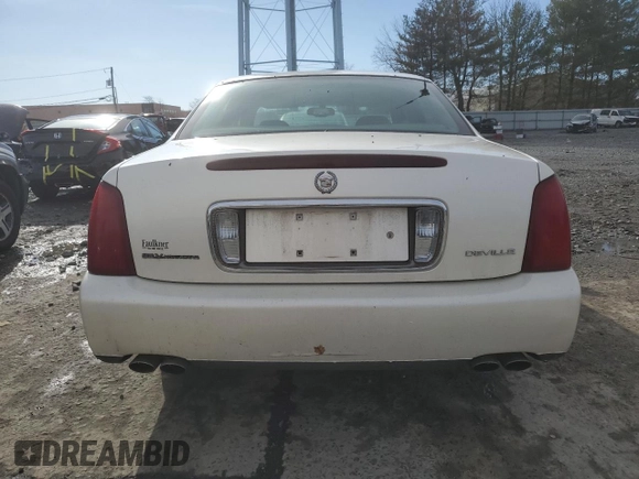 2001 Cadillac DeVille z VIN 1G6KD54YX1U252491, wystawiony jako Copart lot #50325445 z przebiegiem Nie podano mil oraz Szkoda całkowita • Salvage title. Historia ofert i sprzedaży dostępna na DreamBid. Obrazek 6.