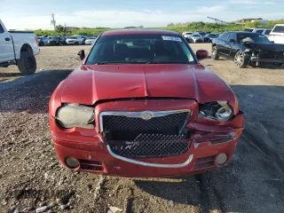 2010 Chrysler 300 with VIN 2C3CA2CVXAH330680, listed as a Copart auction lot 71732154 with 169,895 mi miles and Salvage Title. Bid and sale history available at carsss.com. Image 5.
