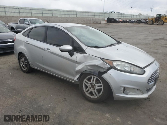 2014 Ford Fiesta SE z VIN 3FADP4BJ8EM133030, wystawiony jako Copart lot #52046065 z przebiegiem 113 792 mil mil oraz Szkoda całkowita • Salvage title. Historia ofert i sprzedaży dostępna na DreamBid. Obrazek 4.