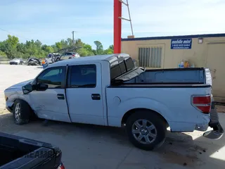 2014 Ford F-150 XL with VIN 1FTFW1CT5EKG08435, listed as a IAAI auction lot 41886526 with 215,364 mi miles. Bid and sale history available at carsss.com. Image 15.