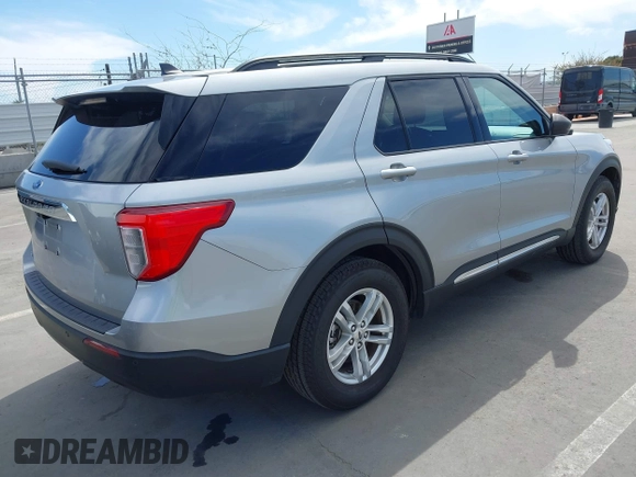 2023 Ford Explorer XLT with VIN 1FMSK7DH6PGA37708, listed as a IAAI auction lot 41996536 with 59,064 mi miles. Bid and sale history available at carsss.com. Image 4.