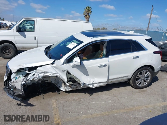 2023 Cadillac XT5 AWD Premium Luxury with VIN 1GYKNDRS4PZ195431, listed as a IAAI auction lot 41714459 with 13,207 mi miles and . Bid and sale history available at DreamBid. Image 14.