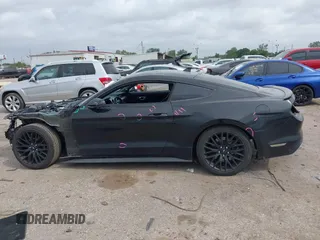 2021 Ford Mustang GT with VIN 1FA6P8CF8M5137318, listed as a IAAI auction lot 41934683 with 62,473 mi miles and . Bid and sale history available at DreamBid. Image 14.