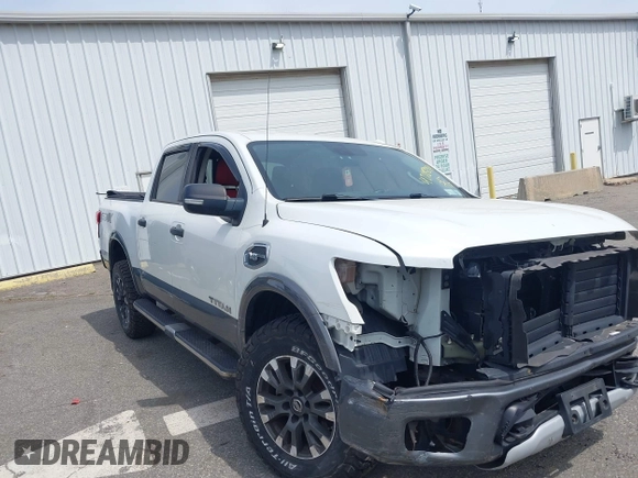 2017 Nissan Titan SV with VIN 1N6AA1E50HN540827, listed as a IAAI auction lot 42105294 with 139,914 mi miles and . Bid and sale history available at DreamBid. Image 1.