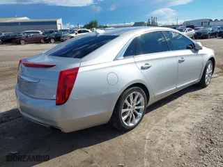 2015 Cadillac XTS Luxury with VIN 2G61N5S36F9251701, listed as a IAAI auction lot 40315224 with 99,918 mi miles. Bid and sale history available at carsss.com. Image 4.