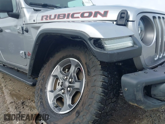 2020 Jeep Gladiator Rubicon z VIN 1C6JJTBG7LL181833, wystawiony jako IAAI lot #42493073 z przebiegiem 13 775 mil mil oraz . Historia ofert i sprzedaży dostępna na DreamBid. Obrazek 6.