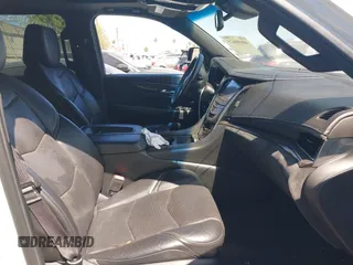 2016 Cadillac Escalade Platinum z VIN 1GYS4DKJ6GR290318, wystawiony jako IAAI lot #40090625 z przebiegiem Nie podano mil oraz . Historia ofert i sprzedaży dostępna na DreamBid. Obrazek 5.