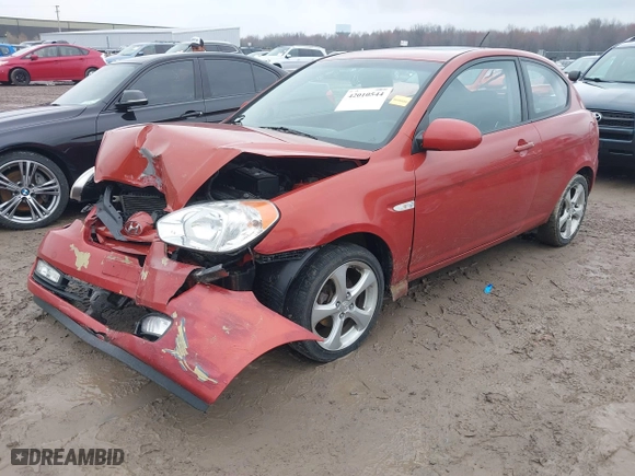 2008 Hyundai Accent SE with VIN KMHCN36C58U070319, listed as a IAAI auction lot 42010544 with 118,487 mi miles. Bid and sale history available at carsss.com. Image 16.