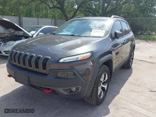 2015 Jeep Cherokee Trailhawk with VIN 1C4PJMBS8FW653568, listed as a IAAI auction lot 41960320 with 146,362 mi miles. Bid and sale history available at carsss.com. Image 17.