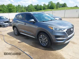 2019 Hyundai Tucson Sport z VIN KM8J33AL9KU014718, wystawiony jako IAAI lot #42107354 z przebiegiem 76 765 mil mil oraz . Historia ofert i sprzedaży dostępna na DreamBid. Obrazek 1.