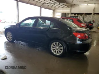 2010 Chrysler Sebring Limited with VIN 1C3CC5FB2AN229671, listed as a Copart auction lot 62181015 with 229,390 mi miles and Salvage title. Bid and sale history available at DreamBid. Image 2.