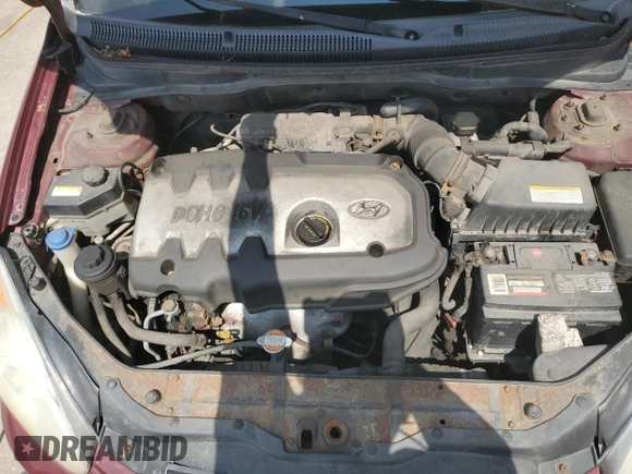 2006 Hyundai Accent GL z VIN KMHCN45C26U052459, wystawiony jako Copart lot #60089355 z przebiegiem 247 311 mil mil oraz Szkoda całkowita • Salvage title. Historia ofert i sprzedaży dostępna na DreamBid. Obrazek 11.