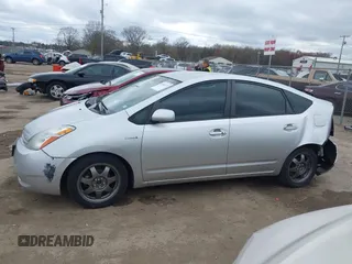 2007 Toyota Prius z VIN JTDKB20U977666406, wystawiony jako IAAI lot #42081233 z przebiegiem Nie podano mil oraz . Historia ofert i sprzedaży dostępna na DreamBid. Obrazek 14.
