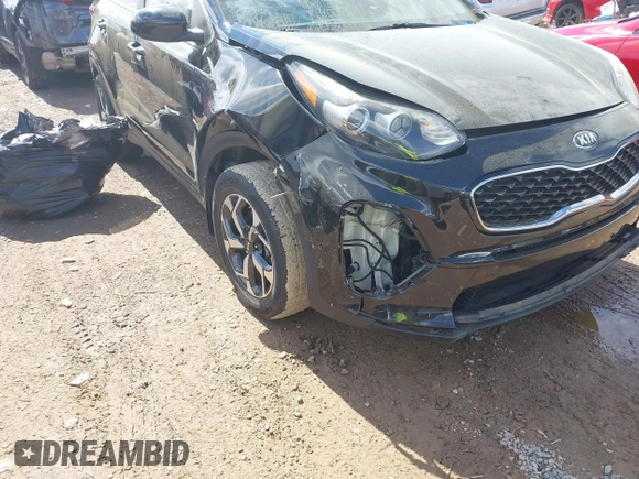 2020 Kia Sportage LX with VIN KNDPM3AC7L7755719, listed as a IAAI auction lot 42026994 with 49,537 mi miles and . Bid and sale history available at DreamBid. Image 20.