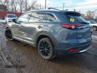 2022 Mazda CX-9 Grand Touring with VIN JM3TCBDYXN0618313, listed as a IAAI auction lot 41452750 with 34,356 mi miles and . Bid and sale history available at DreamBid. Image 3.