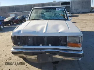 1992 Ford Ranger with VIN 1FTCR10A5NTA34829, listed as a Copart auction lot 80017304 with 77,947 mi miles and Salvage Title. Bid and sale history available at carsss.com. Image 5.
