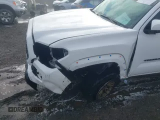 2019 Toyota Tacoma SR z VIN 3TMCZ5AN9KM284092, wystawiony jako IAAI lot #41774851 z przebiegiem 100 031 mil mil oraz . Historia ofert i sprzedaży dostępna na DreamBid. Obrazek 17.
