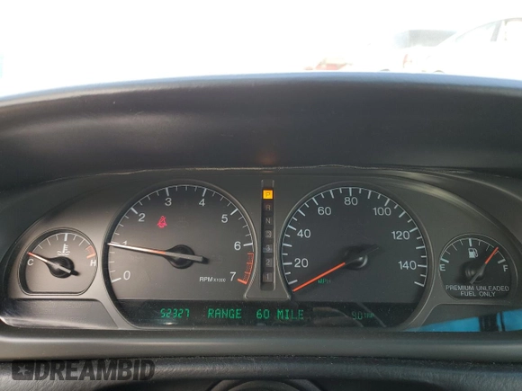 1999 Cadillac Eldorado Touring z VIN 1G6ET1298XU602343, wystawiony jako Copart lot #44327195 z przebiegiem 52 327 mil mil oraz Szkody całkowita. Historia ofert i sprzedaży dostępna na DreamBid. Obrazek 9.