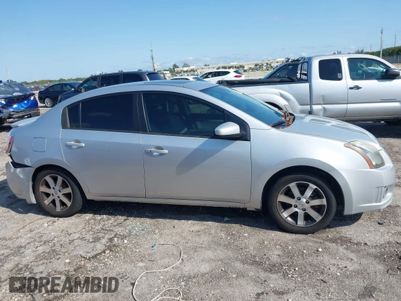 2012 Nissan Sentra S with VIN 3N1AB6AP6CL666593, listed as a IAAI auction lot 41995732 with 142,396 mi miles and . Bid and sale history available at DreamBid. Image 14.