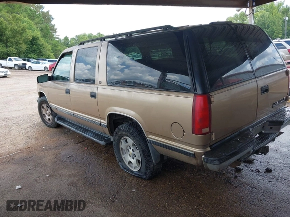 1999 Chevrolet Suburban with VIN 1GNFK16RXXJ416360, listed as a IAAI auction lot 42670294 with 319,691 mi miles and . Bid and sale history available at DreamBid. Image 3.