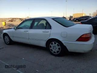 2000 Acura RL with VIN JH4KA9658YC006540, listed as a Copart auction lot 83498664 with 188,589 mi miles and Salvage Title. Bid and sale history available at carsss.com. Image 2.