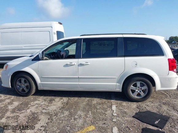 2012 Dodge Grand Caravan SXT with VIN 2C4RDGCGXCR211925, listed as a IAAI auction lot 41915648 with 150,885 mi miles. Bid and sale history available at carsss.com. Image 14.