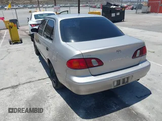 2000 Toyota Corolla VE with VIN 1NXBR12E5YZ369711, listed as a IAAI auction lot 42550174 with 273,785 mi miles and . Bid and sale history available at DreamBid. Image 3.