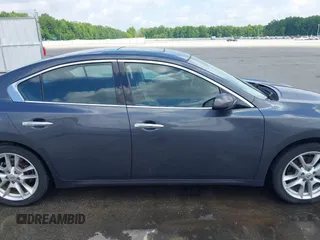 2013 Nissan Maxima SV z VIN 1N4AA5AP2DC831021, wystawiony jako IAAI lot #42255349 z przebiegiem 143 373 mil mil oraz . Historia ofert i sprzedaży dostępna na DreamBid. Obrazek 13.
