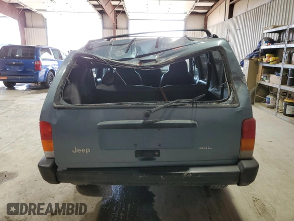 1997 Jeep Cherokee Sport with VIN 1J4FJ68S4VL532609, listed as a Copart auction lot 46711285 with 273,930 mi miles and Salvage Title. Bid and sale history available at carsss.com. Image 6.