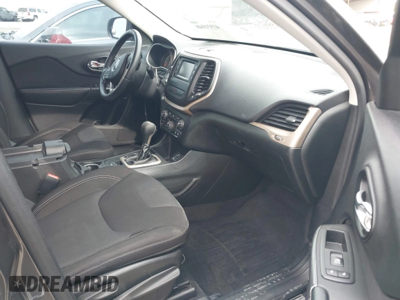 2015 Jeep Cherokee Latitude with VIN 1C4PJLCB0FW601862, listed as a IAAI auction lot 41931048 with 100,705 mi miles and . Bid and sale history available at DreamBid. Image 5.